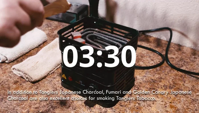 Once red-hot, blow on the coals to ensure complete glowing.