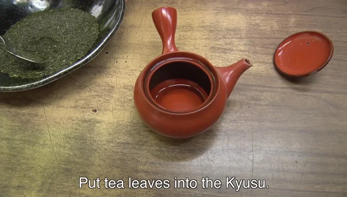 Place tea leaves into the kyusu. One tablespoon of tea leaves is recommended for two cups of tea.