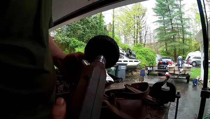 Use an abrasive wheel to smooth out pits and remove stubborn rust.