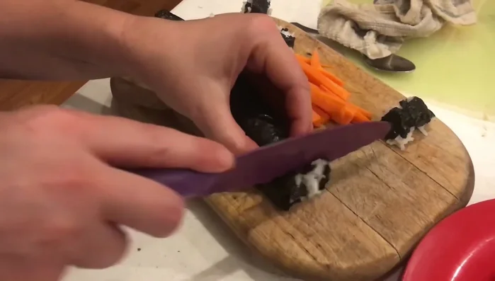 Cut the roll into bite-sized pieces using a sharp knife. Wipe the knife with a wet rag to prevent sticking.