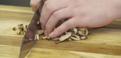 Make inari (fried tofu rice pockets): Gently open the pocket of fried tofu and fill with seasoned rice.