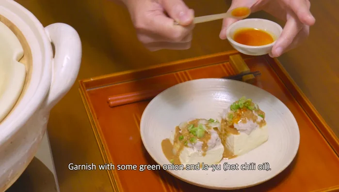 Serve on small plates, pour sesame sauce over, and garnish with green onions.