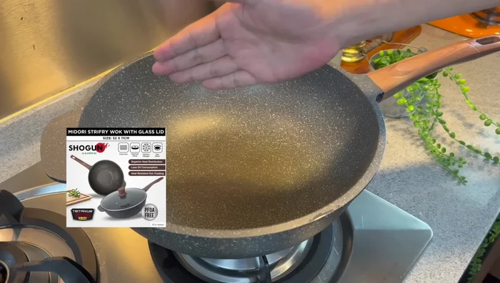 Pan-fry the egg tofu slices in a wok with oil over medium heat for about 2 minutes per side, until golden brown.