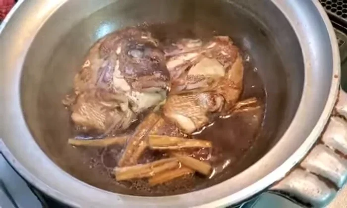 Finish cooking and adjust seasonings. The exact method isn’t explicitly stated, but it involves simmering and careful adjustment of the cooking liquid's consistency.
