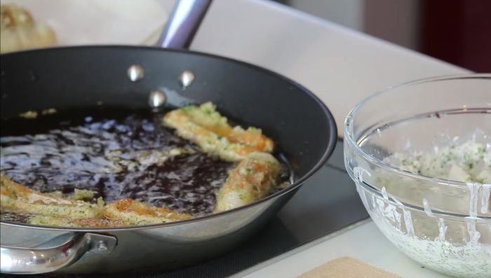 Remove the chikuwa from the oil and place them on a plate lined with paper towels to drain excess oil. Remove any batter residue from the oil between batches.