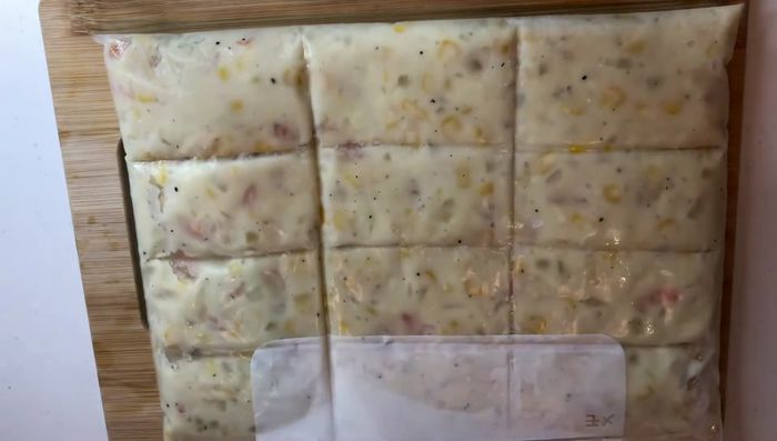 Once chilled, divide the mixture into portions and shape into elongated croquettes.