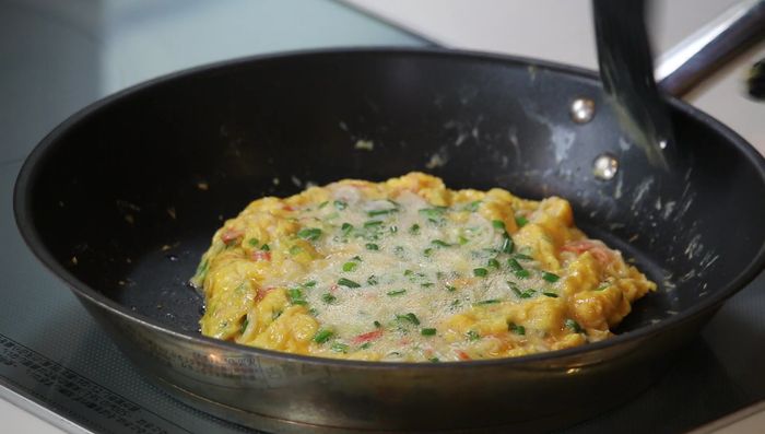 Cook until the bottom is firm, then flip and cook the other side to your liking.
