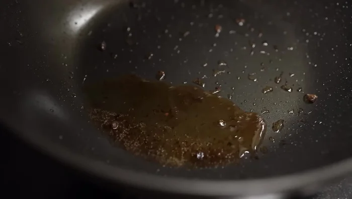 Remove cooked beef and set aside. Don't discard the beef fat; it adds flavor to the sauce.