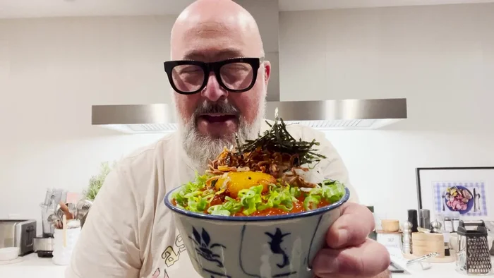 Prepare the ingredients: Cook rice, prepare salmon, crispy shallots, grated radish, thinly sliced nori, scallions, and togarashi.