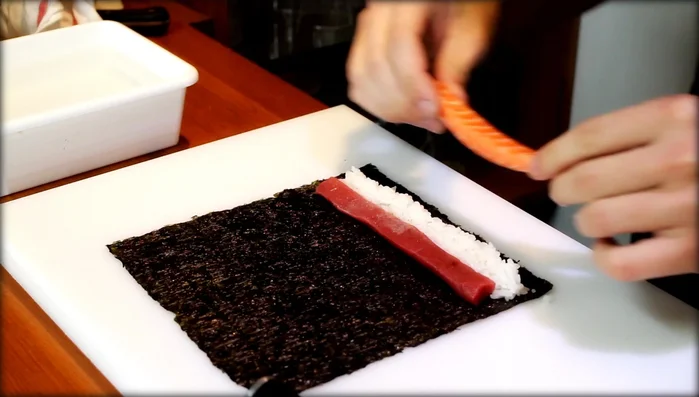 Place salmon over the rice.