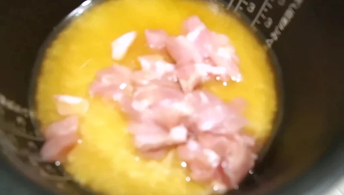 Add the rice to the rice cooker.