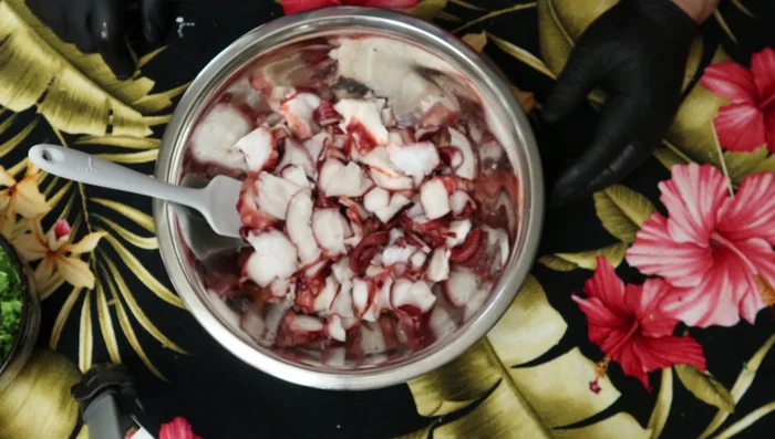 Prepare the octopus: Season about a pound and a quarter of taco (octopus) with Malai or red Hawaiian rock salt. Let it sit for a few minutes.