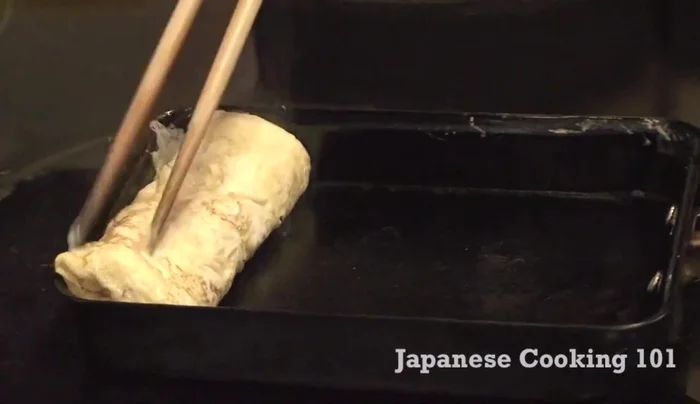 Repeat steps 5 and 6, adding thin layers and rolling until all the egg mixture is used. Oil the pan frequently to prevent sticking.