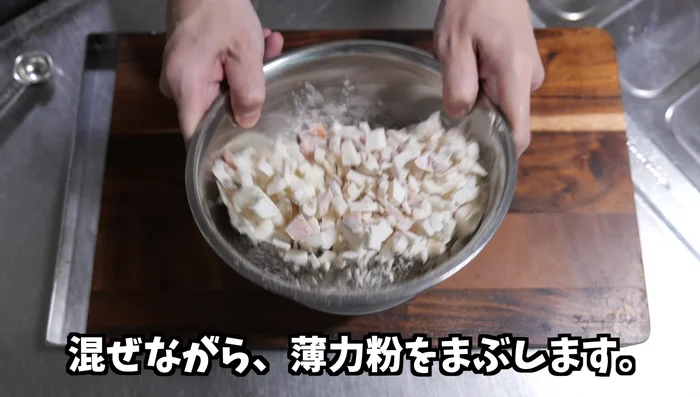 Place the sausages in a bowl, add flour, egg, salt, and pepper. Mix well.