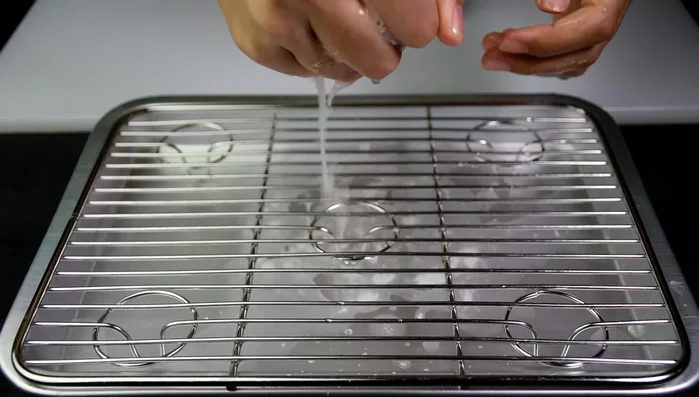 Cut the tofu: Once the paper towels have absorbed the water, carefully cut the tofu into equal-sized pieces. (143.299)