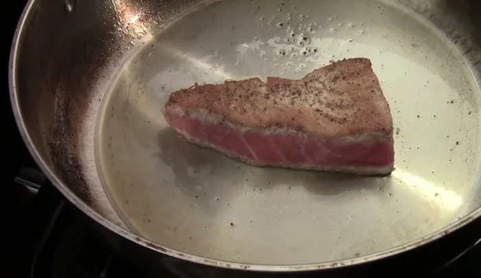 Remove the tuna from the pan and let it rest for 10 minutes before slicing.