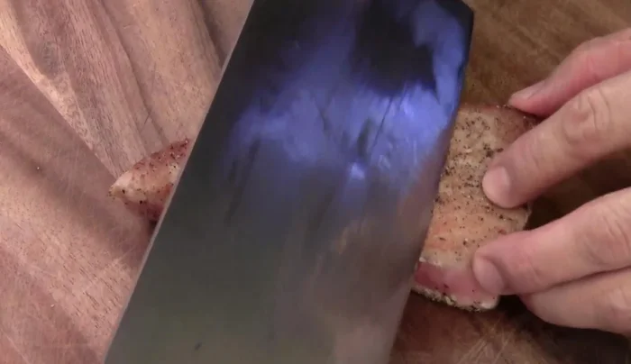 Slice the rested tuna thinly against the grain.