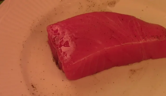 Heat a stainless steel pan. Add a bit of olive oil to the pan.