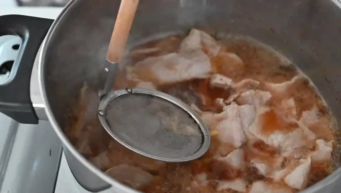 Bring to a boil again, remove any scum that rises to the surface.