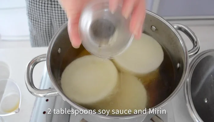 Add soy sauce, mirin, and salt to the dashi. Cook for 10 more minutes, then turn off the heat and let it cool to room temperature.