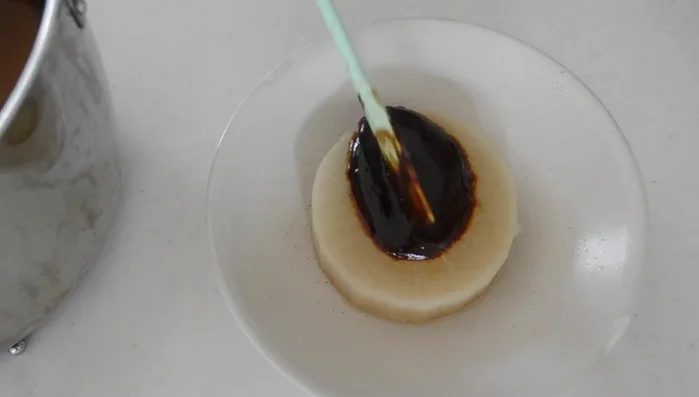Reheat the daikon, transfer to a shallow bowl. Pour the miso sauce over the daikon and sprinkle with yuzu peel.