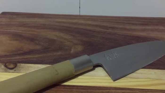 Kai Wasabi deba knife on wood