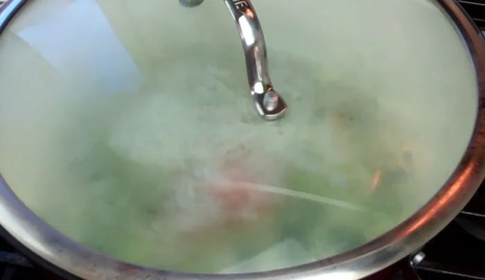 Reduce heat to low, cover, and simmer for about 20-25 minutes, or until the rice is cooked through and the liquid is absorbed. Remove Scotch Bonnet pepper before serving.