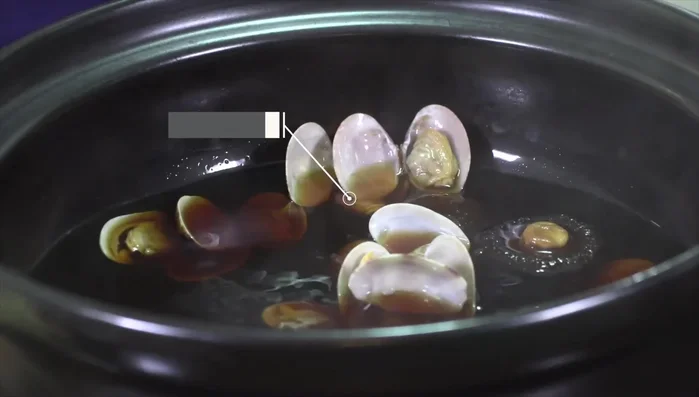 Add fish to the pot and cook until done.
