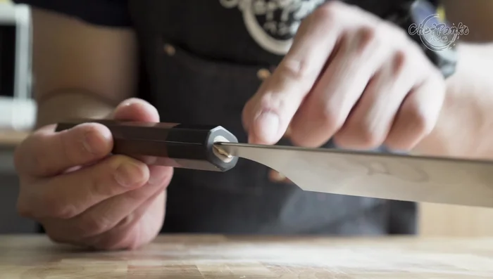 Close-up of Santoku knife handle.