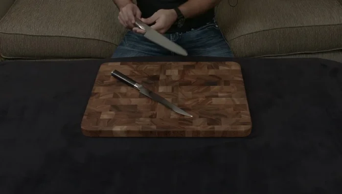 Shun Classic knife on wooden board