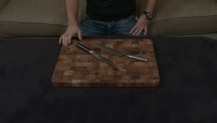 Shun and Global knives on cutting board