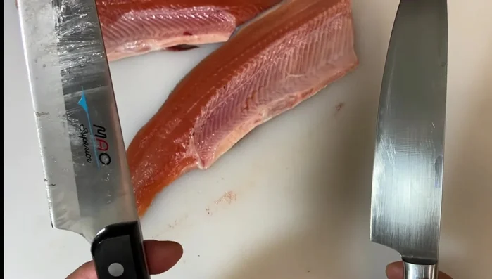 MAC knife slicing salmon fillet