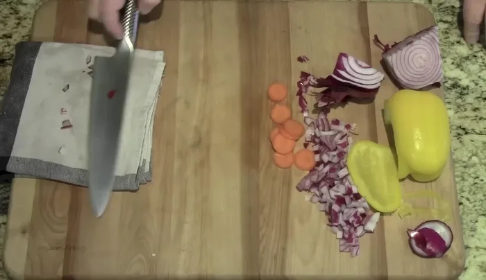 Global G-2 knife slicing vegetables