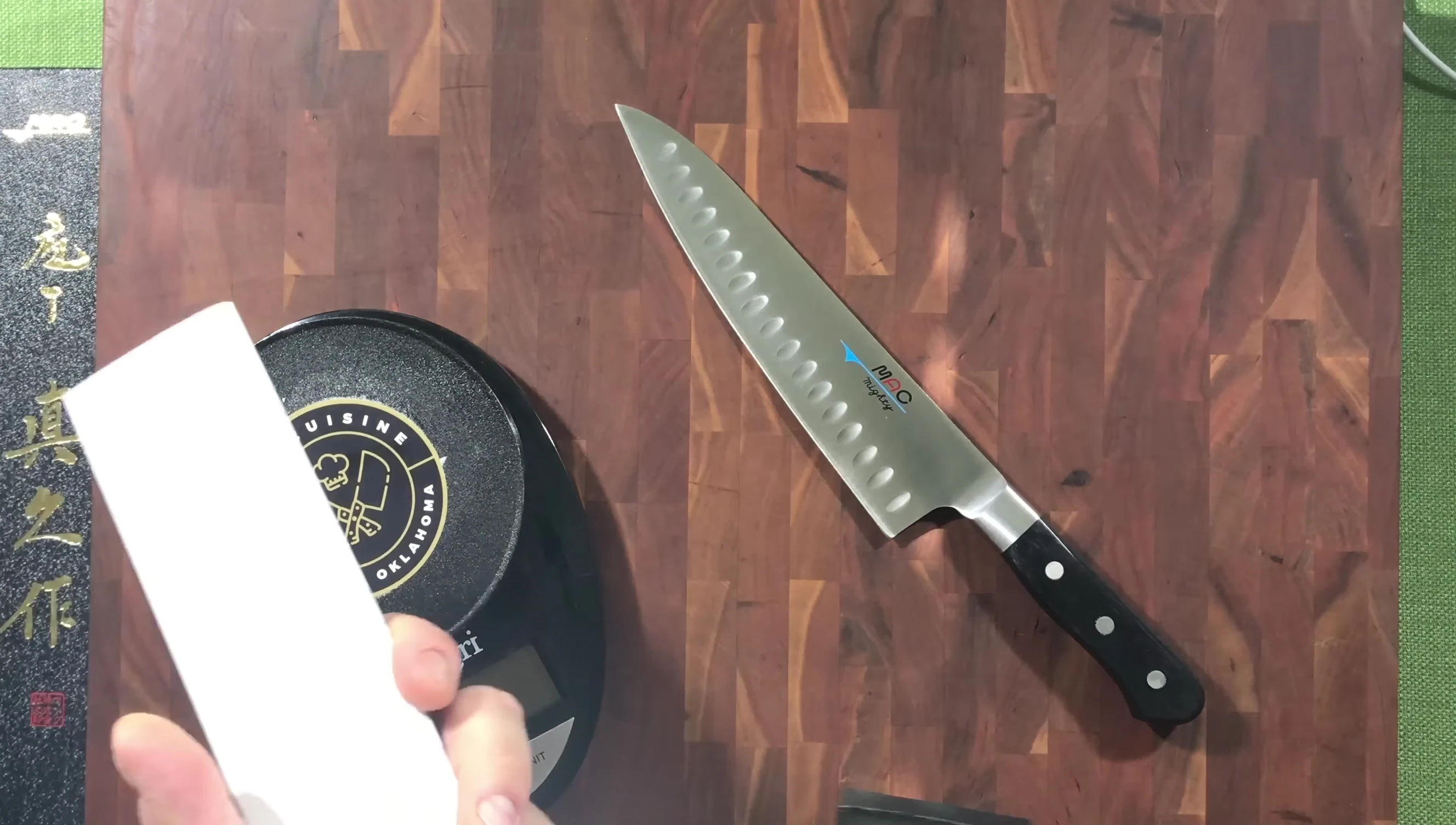 MAC MTH-80 knife on wooden board