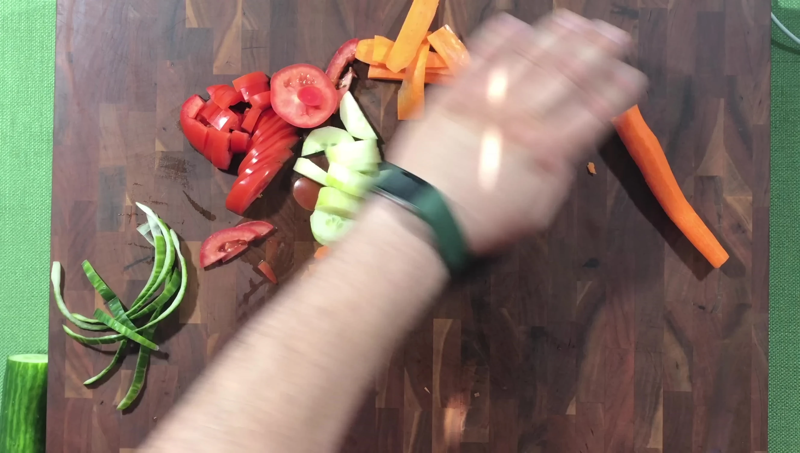 MAC MTH-80 chef's knife slicing vegetables