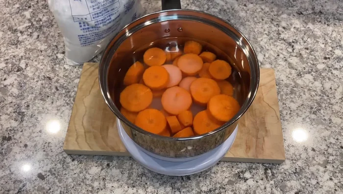 Prepare the carrots. (Specific instructions not available in transcript)