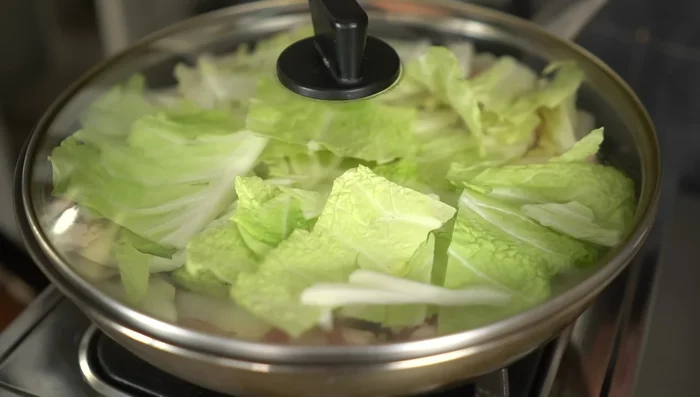 Cover the pan and cook over medium heat for 8 minutes, or until boiling.