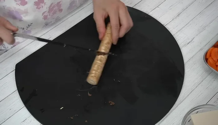 Prepare the burdock root: scrape, wash, and cut diagonally into 5mm pieces. Soak in water.