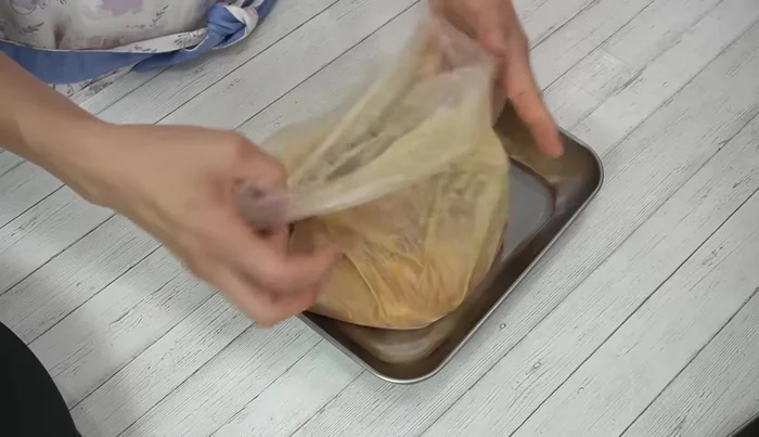 Remove chicken from marinade: Cut the marinade into pieces within the bag and remove the chicken. Wipe off excess marinade with paper towels.