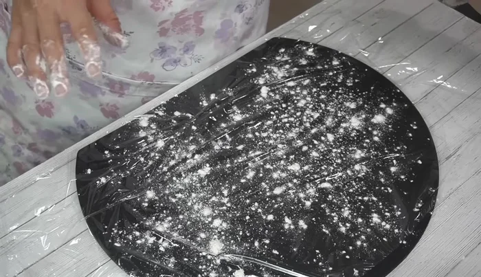 Place dough on a plastic wrap-covered cutting board dusted with powdered sugar (if using). Roll out the dough to about 1cm thickness.