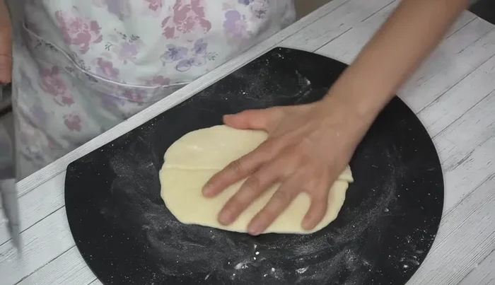 Cut the dough lengthwise in half, then into 1cm wide strips. It's better to cut it slightly thinner as it will expand while frying.