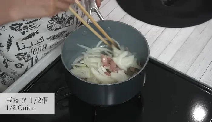 Add onions, stir-fry, and season with salt.