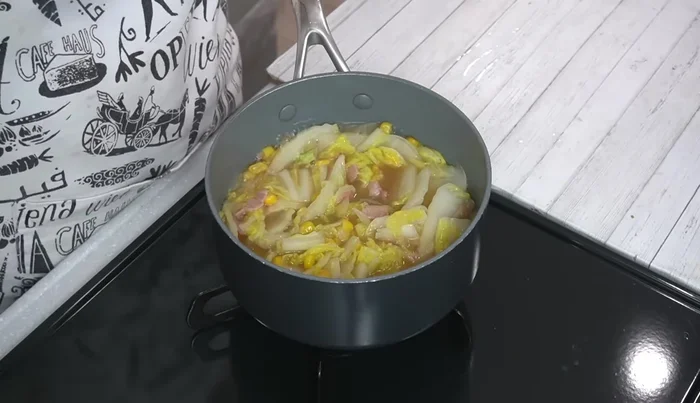 Reduce heat to low, cover, and simmer for 5 minutes.