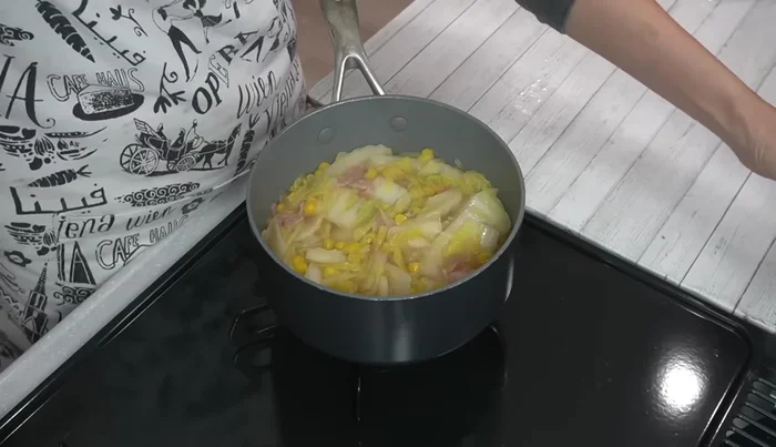 Add soy milk just before boiling; avoid boiling to prevent separation. Turn off the heat once the surface starts to bubble.
