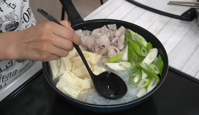 Bring to a boil: Simmer until the tofu is firm.