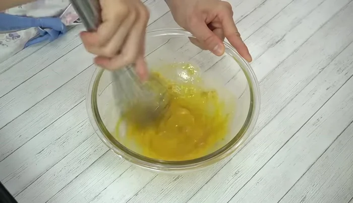 Add sugar and mix quickly to prevent lumpiness.