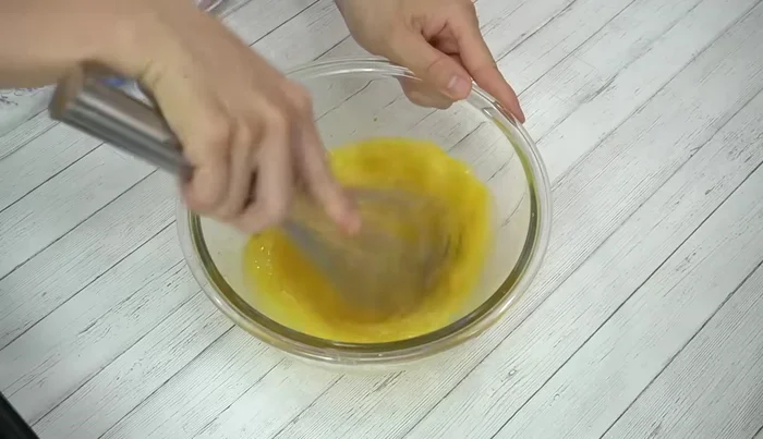 Add melted butter and mix well.