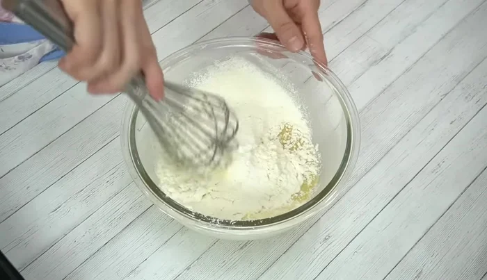 Add pancake mix; gently mix to avoid flour flying everywhere.