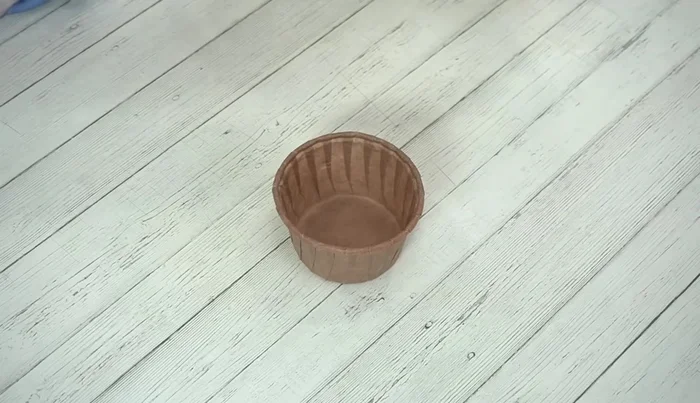 Spoon the batter into cupcake molds, leaving about 1/3 of the molds empty.