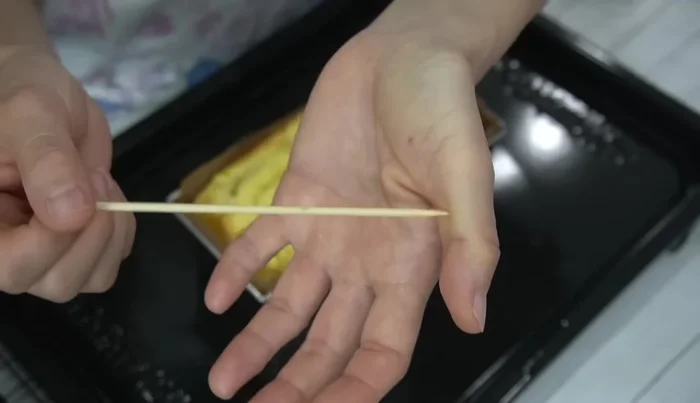 Check for doneness with a bamboo skewer. Remove from the oven and let it cool slightly.